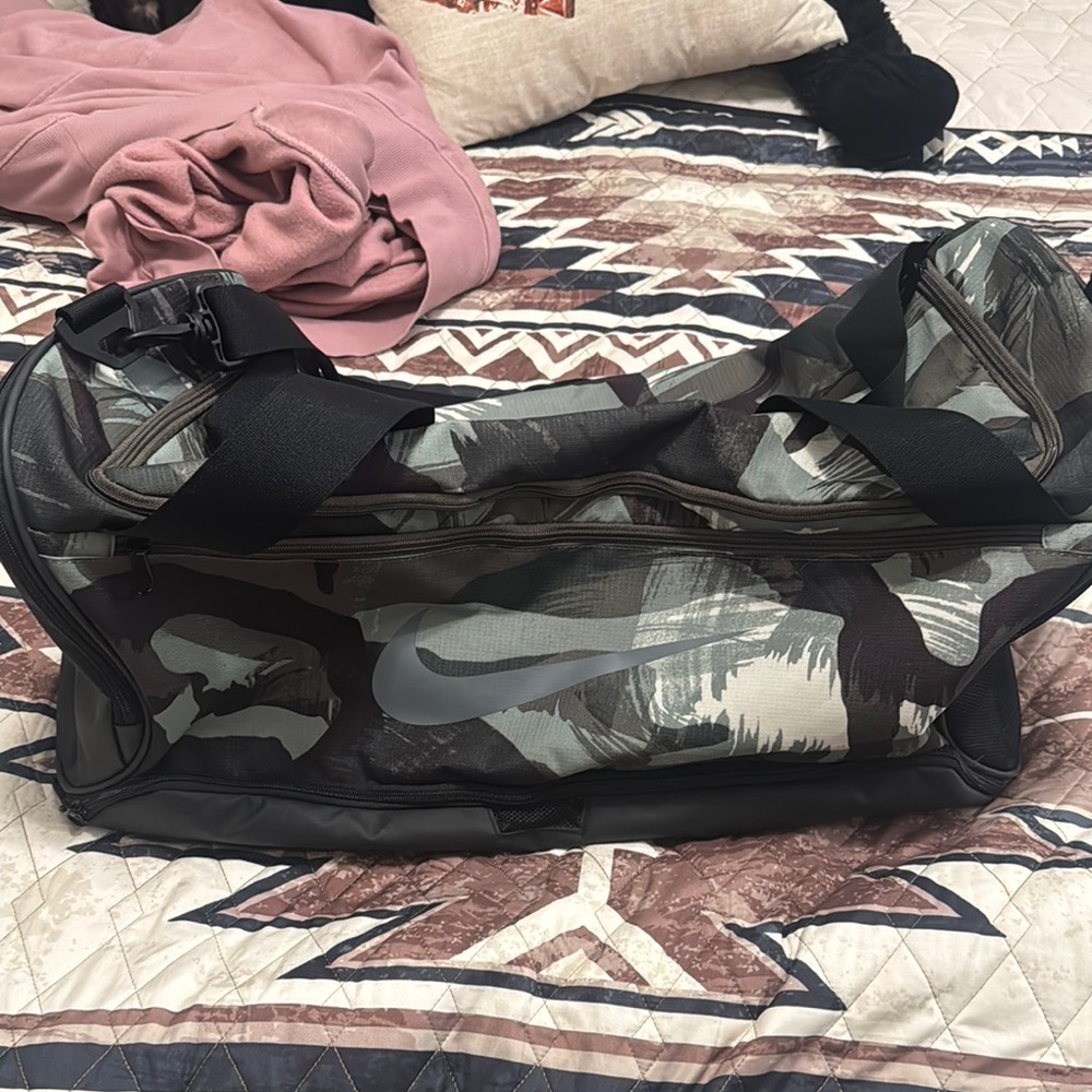 Green Nike duffel bag
